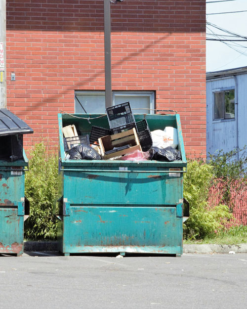 Dumpster filled with trash